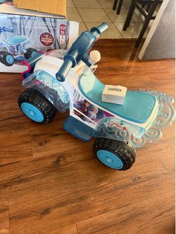 Brand new never used frozen 2 kids electric quad