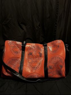 Orange and Black Skull print Duffel Bag