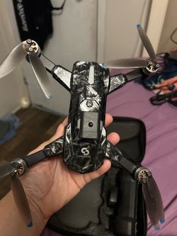 Black and silver drone