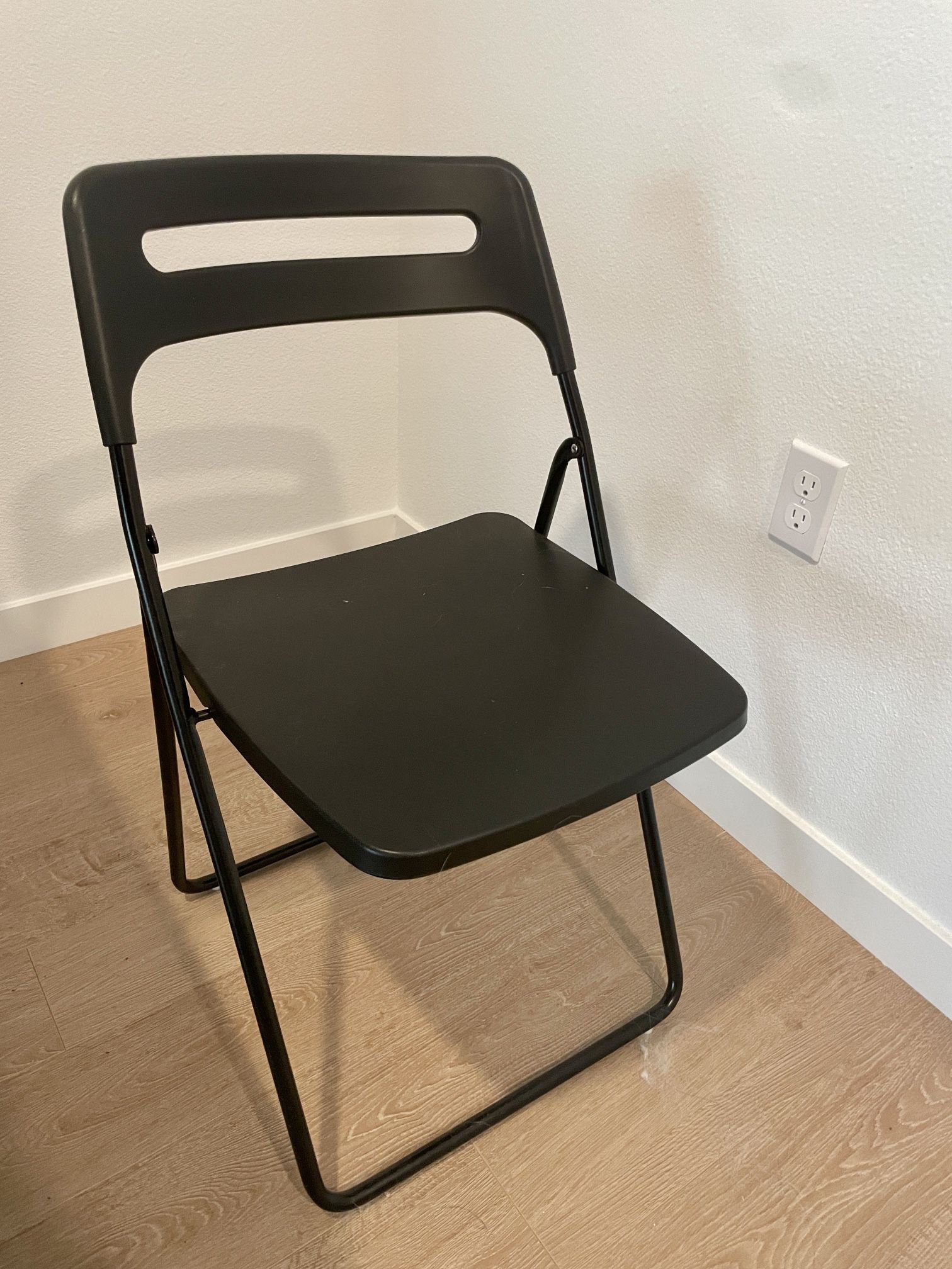 Two Foldable Black Chairs 
