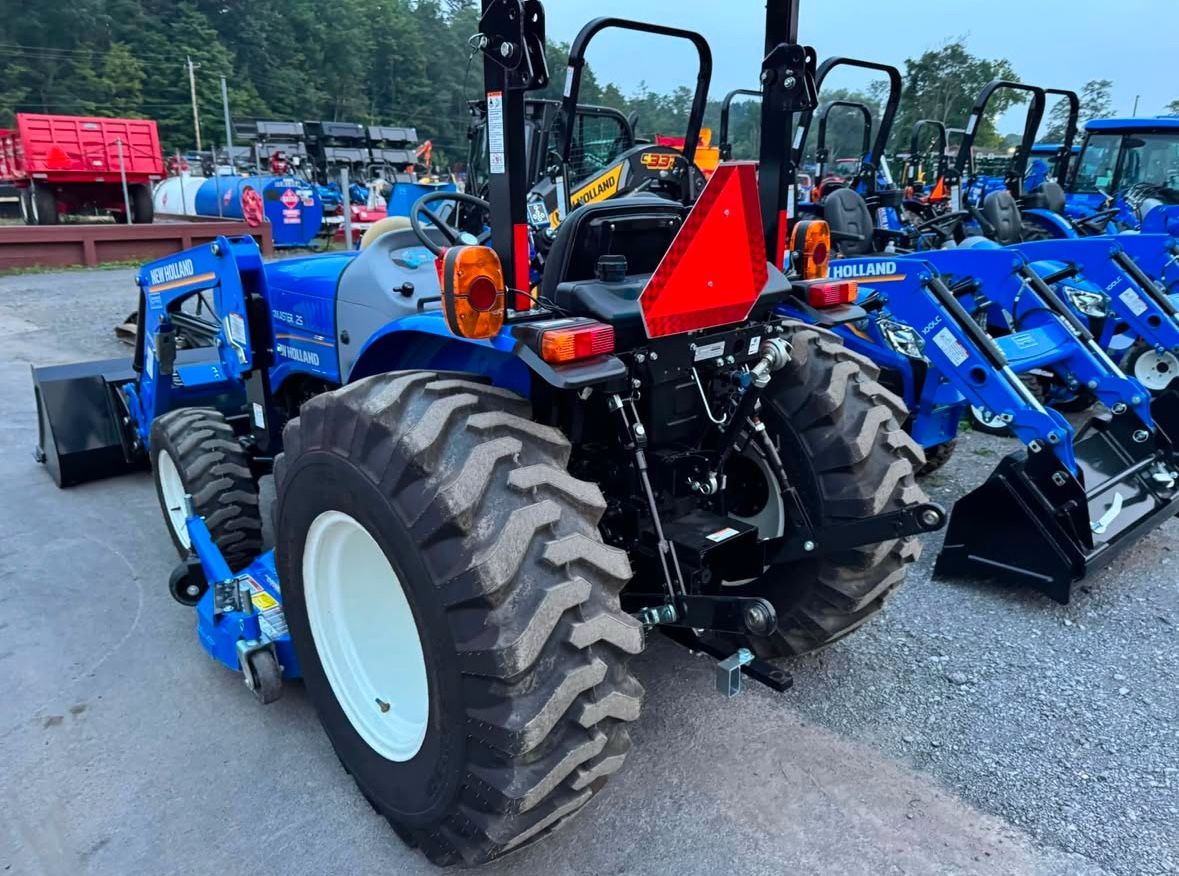 New Holland Agriculture Workmaster 25 Compact Tractor with Loader, 25 Engine HP, Hydrostastic Transmission & 266WM 66" Mid-Mount Mower Deck!