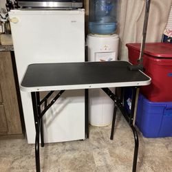 Dog Grooming Table, Adjustable Arm $60  Retail $125 removable arm, folds