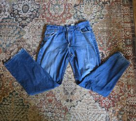 Size 33 Lucky Brand blue denim jeans with a distressed look #distressed