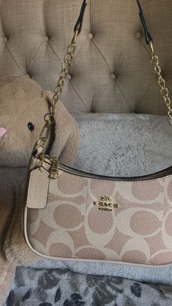 Beige coach purse