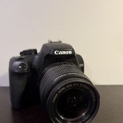 Cannon EOS 1000D + 18-55mm Lens