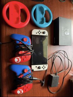 Nintendo switch OLED + two controllers