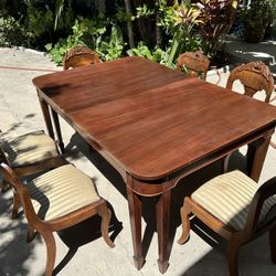 Vintage Mahogany dining table with 6 chairs 