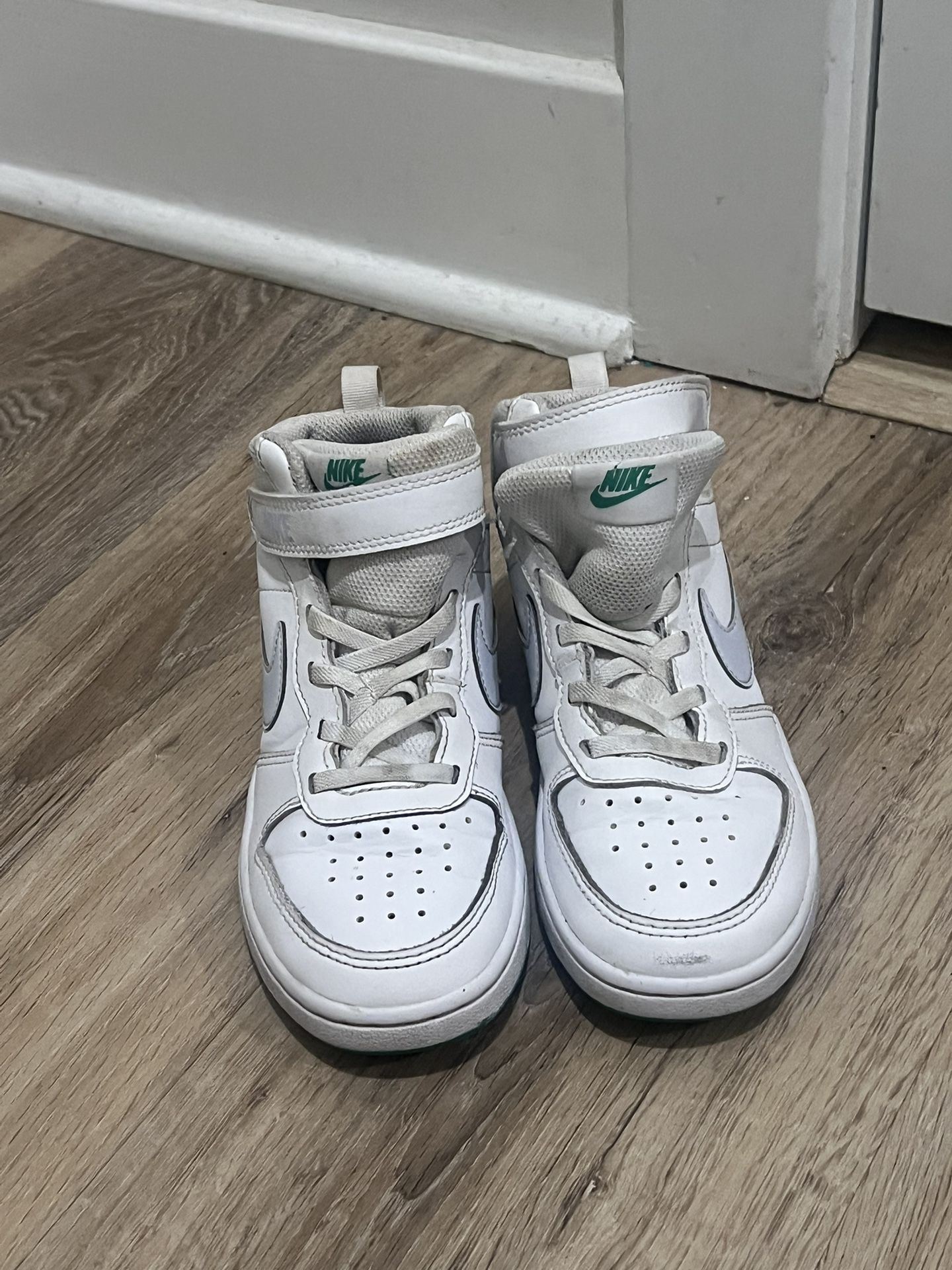 Youth size 1Y Nike Court Borough Mid 2 sneaker