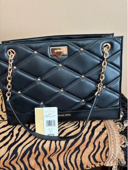 I am selling a brand New Michael Kors backpack