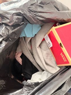 Giant bag of clothes woman