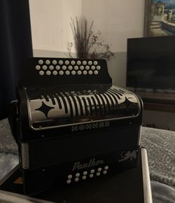 Hohner Panther brand Accordion in perfect condition—like new.