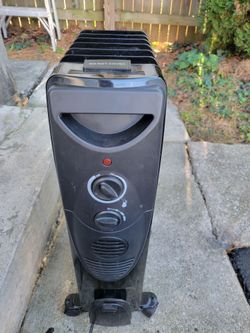 Portable electric oil-filled radiator heater.