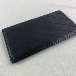 Authentic CHANEL Quilted Black Lamb Skin Leather Wallet. 