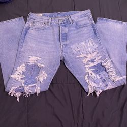 Levis 501 distressed denim jeans 