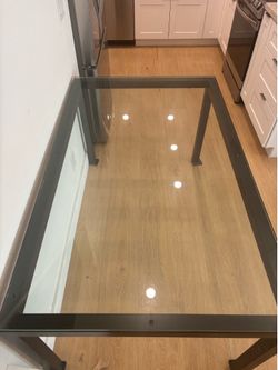 Glass and metal dining table 36”x60”
