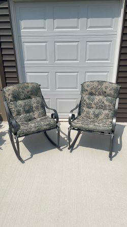 A set of 2 Martha Stewart outdoor rocking chairs. With 2 additional cushions to change out for a 2nd look