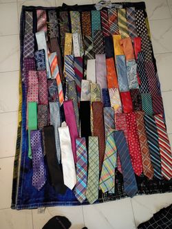 Lot of name brand and generic ties and bow ties