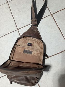Gun coating Mama's backpack