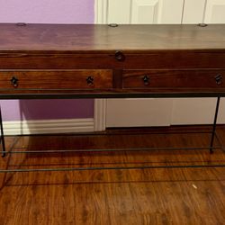 Bombay Company two-drawer console table with a wood top and metal stand