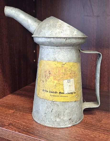Vintage galvanized metal can