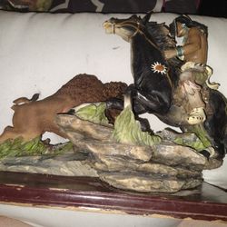 Indian and buffalo statue from the native American collection