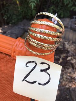 Kids gold plated bracelets 7 pcs.