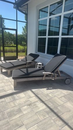 Teak wood loungers set from Rooms to go. Still listed online