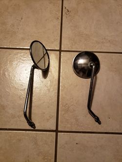 Motorcycle mirrors, one stamped toyo