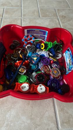 Beyblades + Beyblade Beystadium Battle Arena – $45
