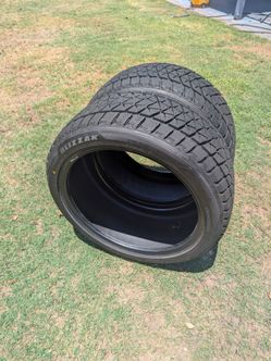 2) 275/40/20 Bridgestone tires