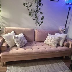 Blush/pink velvet sofa 