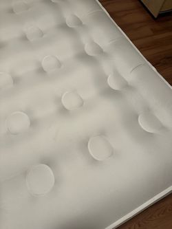 Air mattress with frame and built in pump