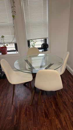 Round Glass Dining Table with 4 Cream Chairs