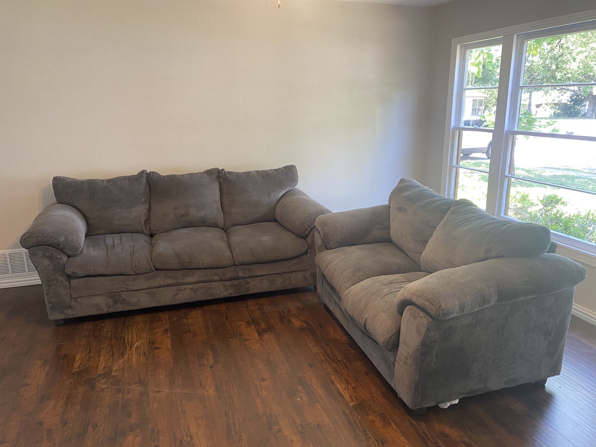 Grey couches moving must sell fast