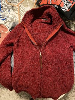 Red fuzzy zip up
