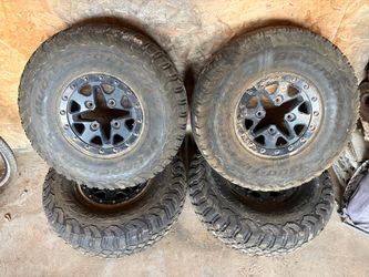 4 BFGoodrich KM3 30x10R14 Tires + Rims