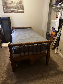 Twin bed frame with mattress and box spring