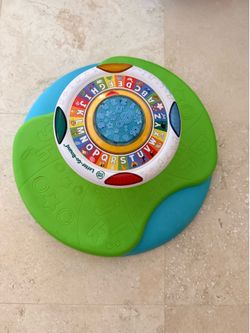 Letter go around spin toy