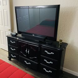 Black And Gray Dresser With 50” Sanyo TV