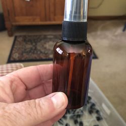 2 Oz Boston Round Plastic PET Amber Bottle With Black Fine Mist Sprayer