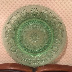 Green depression glass plate