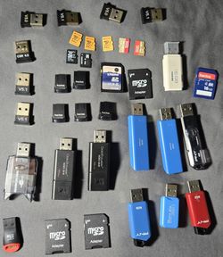 A lot of 22 Micro SD cards, USB storage drives, and Bluetooth dongles. SanDisk, Kodak, Kingston, Toshiba, PNY