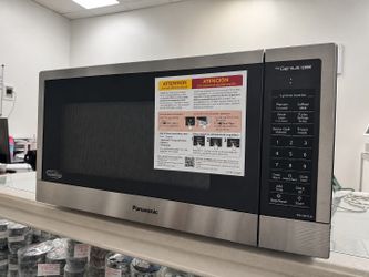 New Panasonic NN-SN76LS 1.6 cu. ft Cyclonic Inverter Countertop Microwave Oven 1250Watt Power with Genius Sensor Cooking, 19.44"D × 21.88"W x 11.94"H
