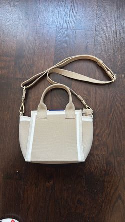 Rothy’s beige crossbody bag