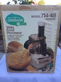 Like new Sunbeam model 714-48 still in box with all attachments