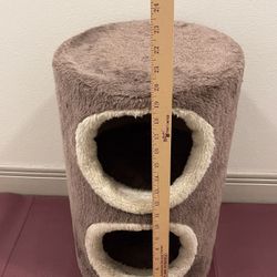 2-Story, Barrel-Shaped Brown KITTY CONDO - posted price is firm. 