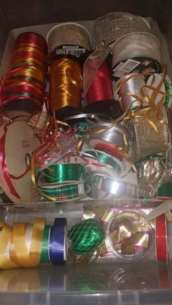 24 spools of Christmas ribbons