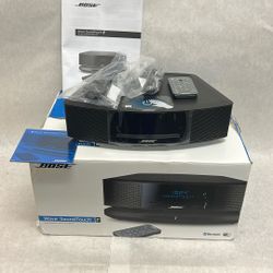 Bose wave sound touch for new open box never used with remote cords and paperwork