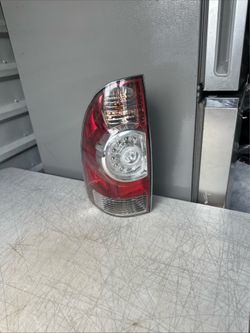 2009-2015 Toyota Tacoma Left Side Tail Light OEM
