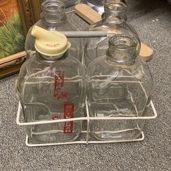 Antique Milk Bottles And Caddy